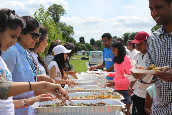 Volunteers serving lunch